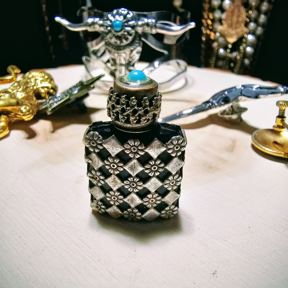 Silver and Black Floral Perfume Bottle